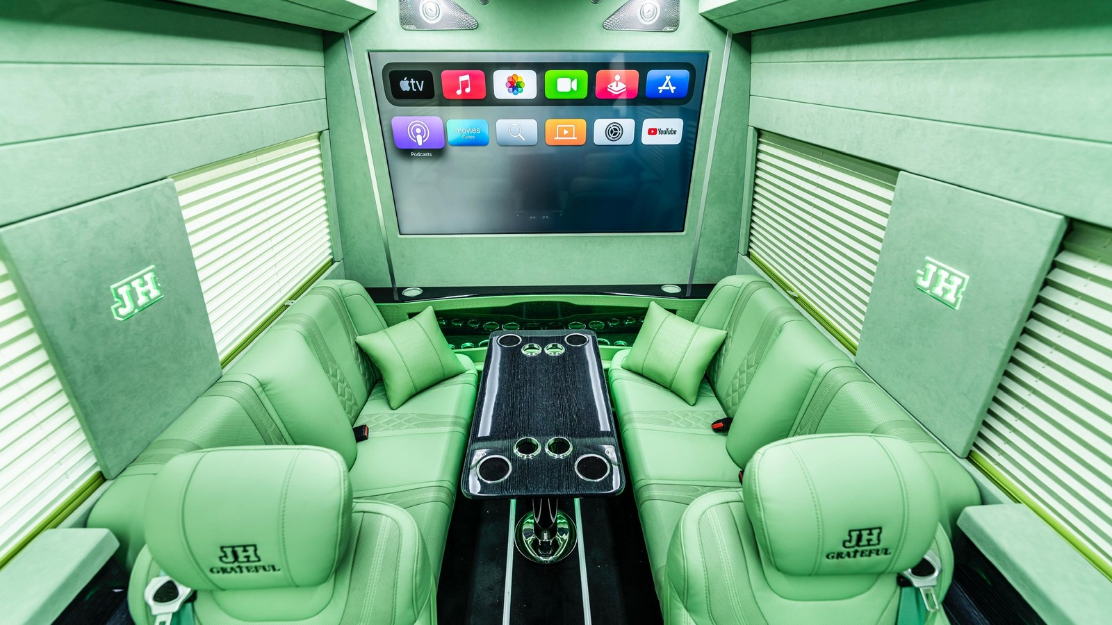 BYJH Anniversary cabin, with its entertainment screen and facing seats